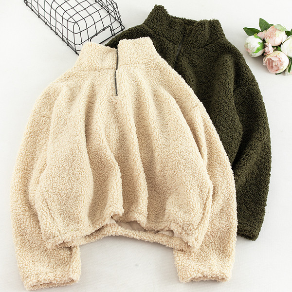 Napi női pulóver négy színben, cipzárral