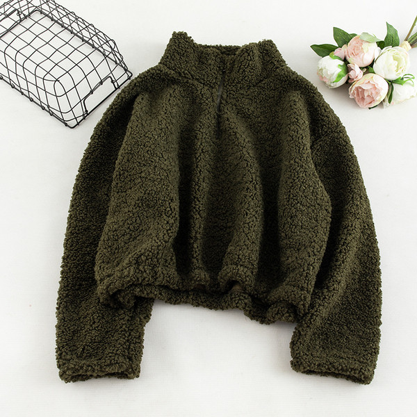 Napi női pulóver négy színben, cipzárral