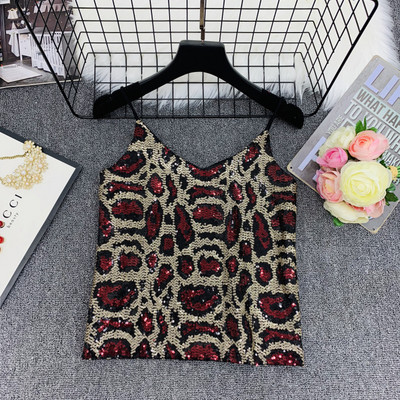 Stílusos női felső vékony pántokkal és flitterekkel