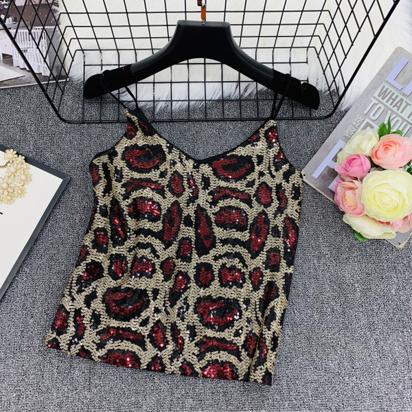 Stílusos női felső vékony pántokkal és flitterekkel