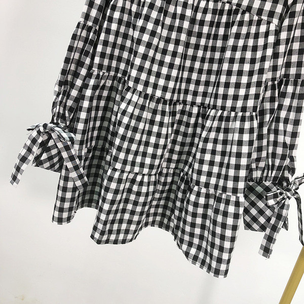 Modern női kockás blúz, hosszú ujjal és nyakkendővel