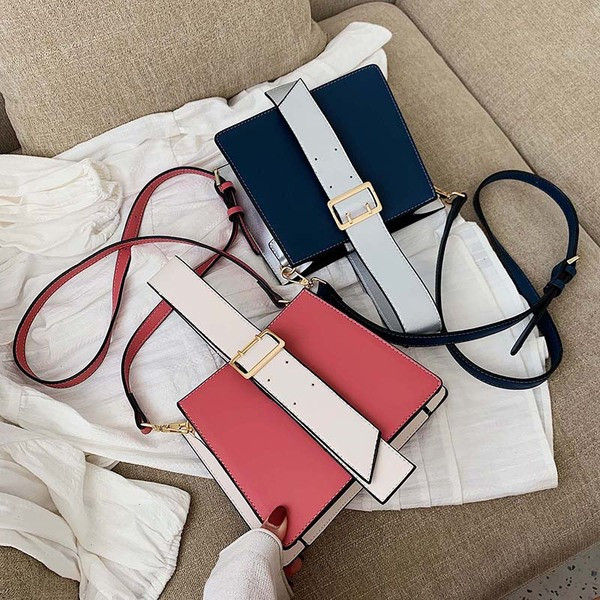 Κομψή γυναικεία τσ΄νατα σε μαύρο, ροζ, μπλε και καφέ χρώμα με λουρί