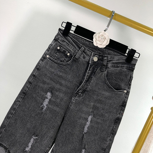 Női alkalmi farmer magas derékkal, szakadt motívummal, fekete színben