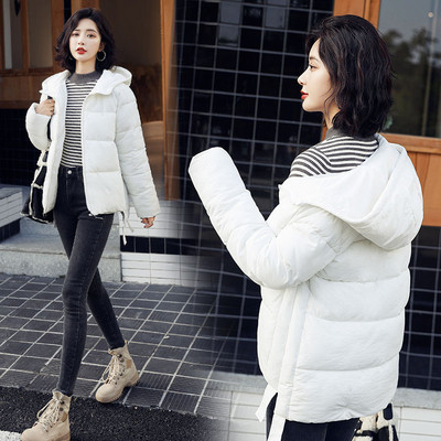 Modern női téli kabát kapucnival és cipzárral - többféle színben