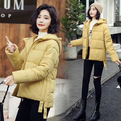 Modern női téli kabát kapucnival és cipzárral - többféle színben