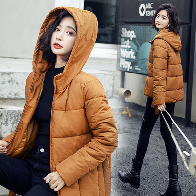 Modern női téli kabát kapucnival és cipzárral - többféle színben