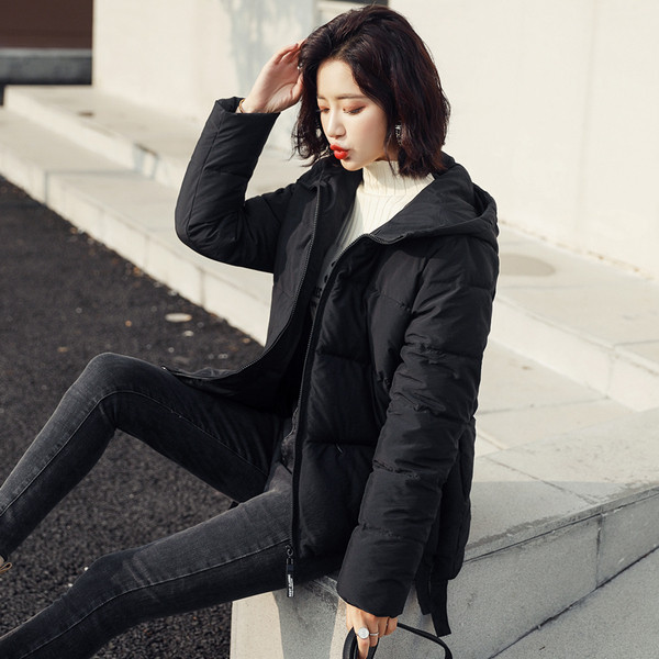Modern női téli kabát kapucnival és cipzárral - többféle színben