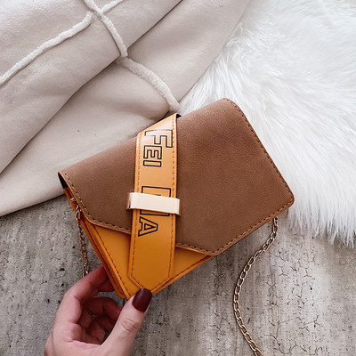 Κομψή γυναικεία τσάντα σε κίτρινο, κόκκινο και μαύρο χρώμα