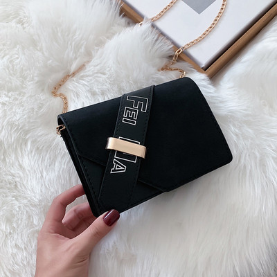 Κομψή γυναικεία τσάντα σε κίτρινο, κόκκινο και μαύρο χρώμα