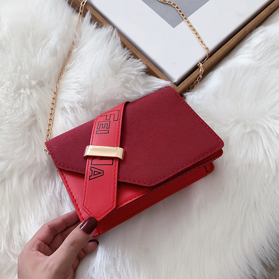 Κομψή γυναικεία τσάντα σε κίτρινο, κόκκινο και μαύρο χρώμα