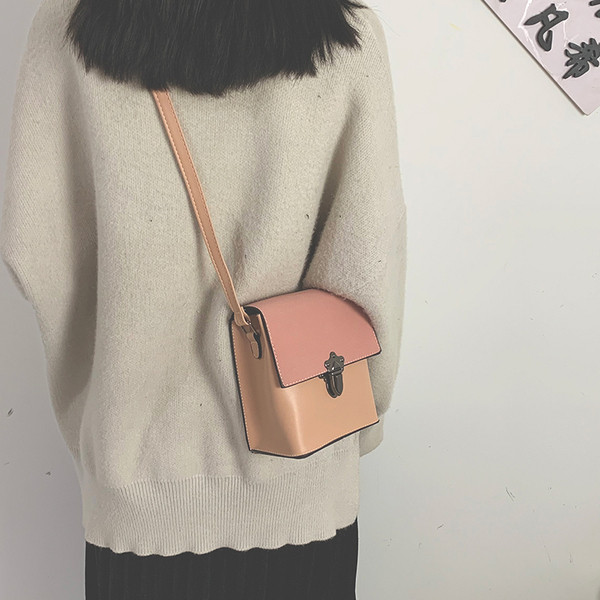 Öko bőrből készült modern női táska fém rögzítéssel több színben