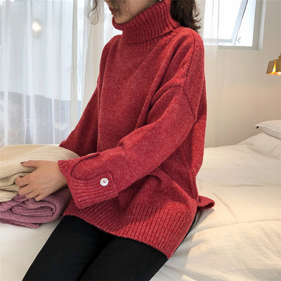 Női aktuális széles pulóver három színben, gombokkal