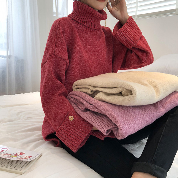 Női aktuális széles pulóver három színben, gombokkal