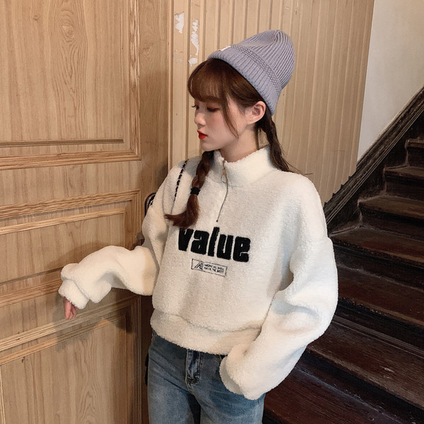 Puha női rövid blúz több színben cipzárral és felirattal