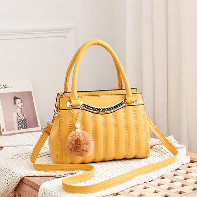 Stílusos női táska rövid és hosszú füllel