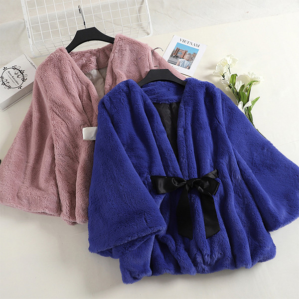 Stílusos női pehelykabát több színben szalaggal