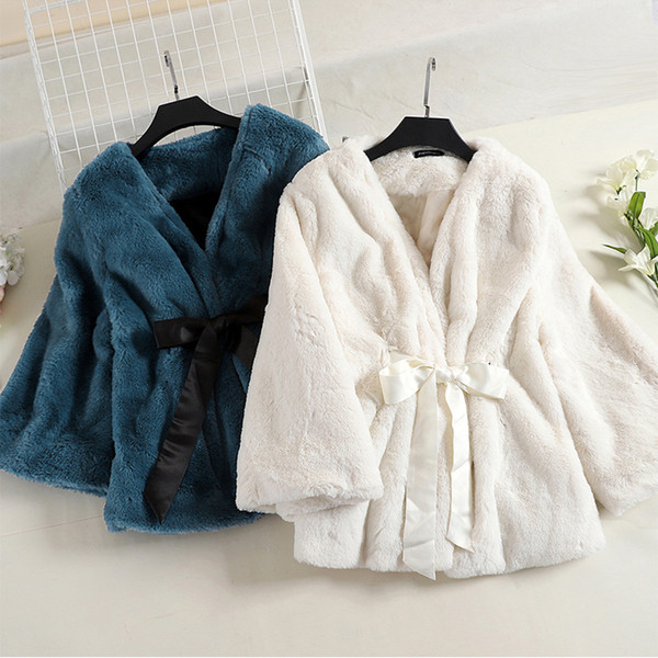 Stílusos női pehelykabát több színben szalaggal