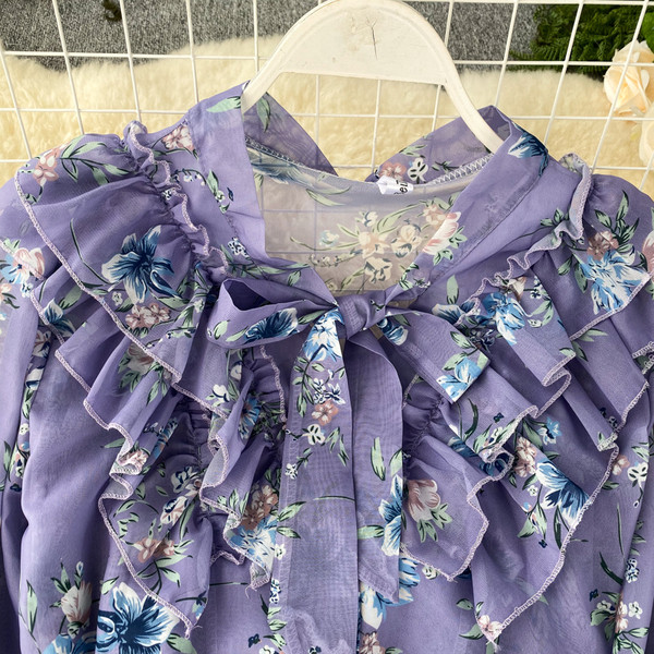 Virágmintás női ing kék szalaggal