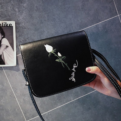 Γυναικεία τσάντες με κεντήματα σε μαύρο, πράσινο, μοβ και καφέ χρώμα