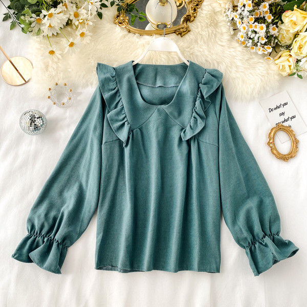 Μοντέρνα γυναικεία μπλούζα με λαιμόκοψη σε διάφορα χρώματα