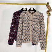 Női alkalmi mellény gombokkal és színes mintával - két színben