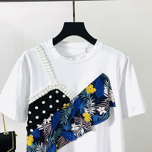 Κομψή γυναικεία μπλούζα με κοντό μανίκι και έγχρωμη εφαρμογή σε μαύρο χρώμα