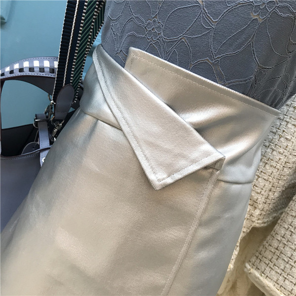 Μοντέρνα γυναικεία  έκο δερμάτινη φούστα σε μαύρο και ασημί χρώμα