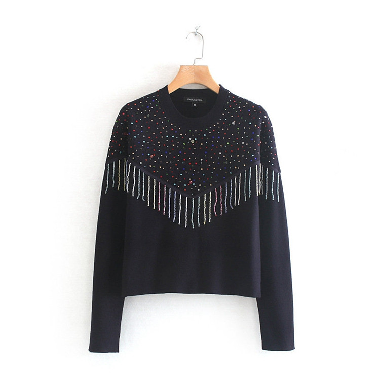 Γυναικείο πουλόβερ  σε σκούρο χρώμα με κρόσσια και πούλιες