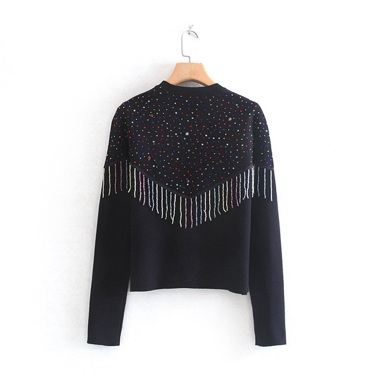 Γυναικείο πουλόβερ  σε σκούρο χρώμα με κρόσσια και πούλιες