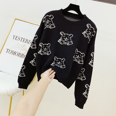 Μοντέρνο γυναικείο πουλόβερ με στρόγγυλη λαιμόκοψη σε λευκό και μαύρο χρώμα