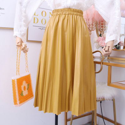 Új modell modern női rakott szoknya sárga, zöld, rózsaszín és fekete színekben