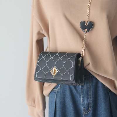 Geanta de dama din piele ecologica cu inchizatoare metalica si maner lung