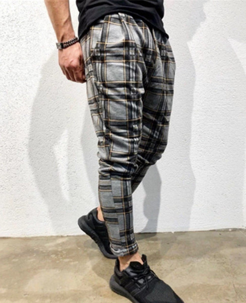 Pantaloni barbati in carouri cu buzunare in mai multe culori