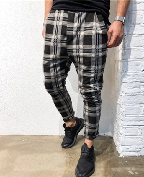 Pantaloni barbati in carouri cu buzunare in mai multe culori