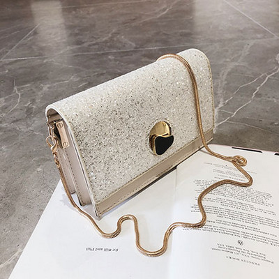 Geanta de dama eleganta cu paiete si maner lung in alb-negru