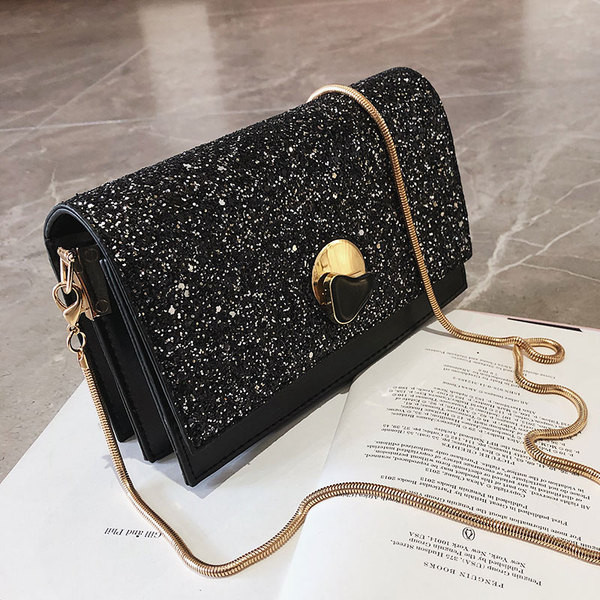 Geanta de dama eleganta cu paiete si maner lung in alb-negru