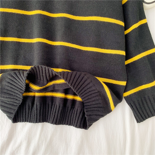 Γυναικεία ριγέ πουλόβερ φαρδιά μοτίβο σε μαύρο και κόκκινο χρώμα