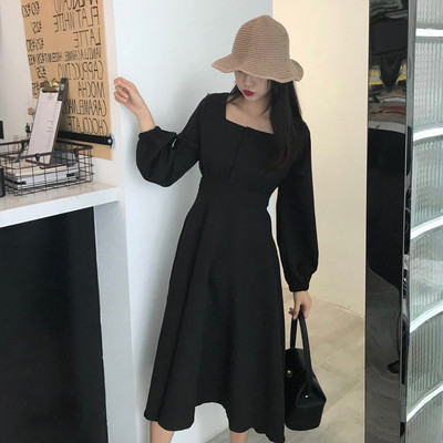 Μακρύ  γυναικείο φόρεμα  με φαρδιά μανίκια και κουμπιά