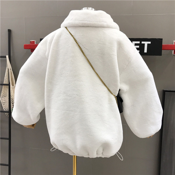 Rózsaszín és fehér cipzáras női pehely pulóver