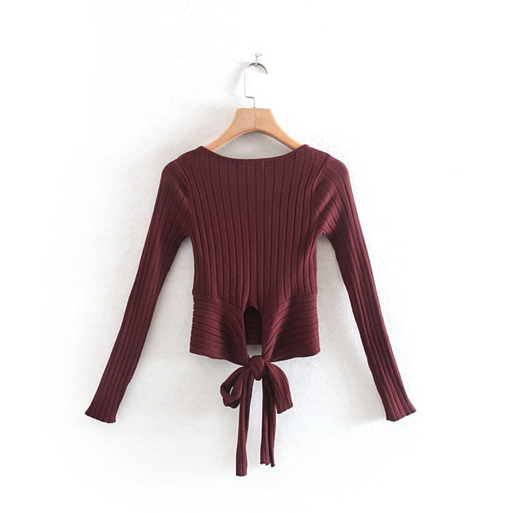 Rövid női blúz, hosszú ujjal és derékkötővel