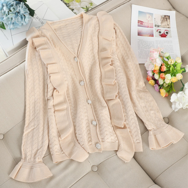 Modern női mellény spitz nyakkivágással és gombokkal