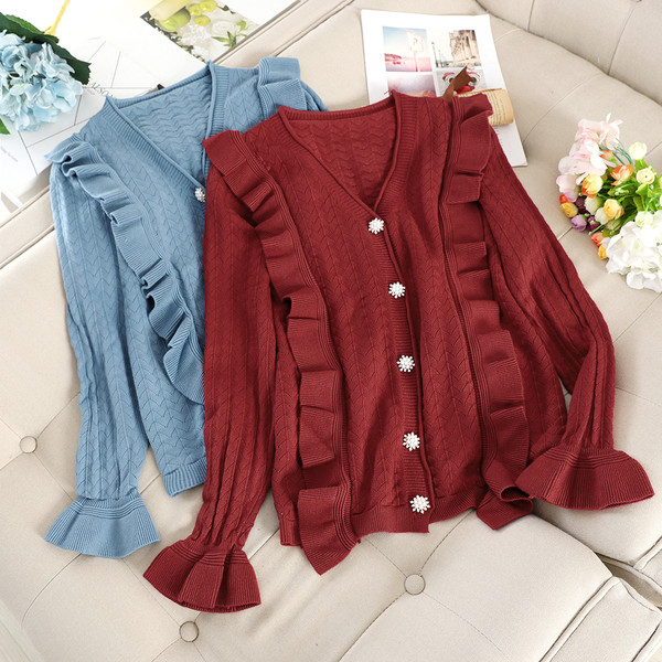 Modern női mellény spitz nyakkivágással és gombokkal