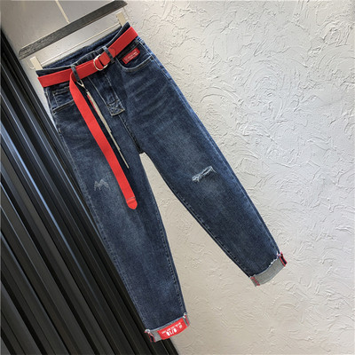 Γυναικεία τζιν με ζώνη και σκισμένο μοτίβο σε μπλε χρώμα