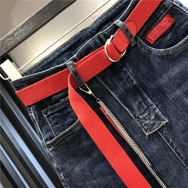 Γυναικεία τζιν με ζώνη και σκισμένο μοτίβο σε μπλε χρώμα