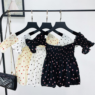 Γυναικεία μπλούζα με κοντό μανίκι και γυμνούς ώμους σε λευκό, μαύρο και κίτρινο χρώμα