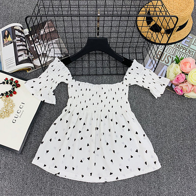 Γυναικεία μπλούζα με κοντό μανίκι και γυμνούς ώμους σε λευκό, μαύρο και κίτρινο χρώμα