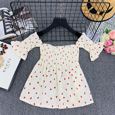 Γυναικεία μπλούζα με κοντό μανίκι και γυμνούς ώμους σε λευκό, μαύρο και κίτρινο χρώμα