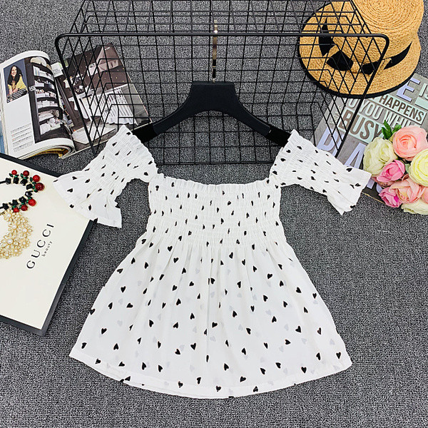 Γυναικεία μπλούζα με κοντό μανίκι και γυμνούς ώμους σε λευκό, μαύρο και κίτρινο χρώμα