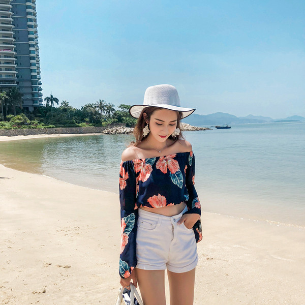 Γυναικεία μπλούζα με μανίκι λωτού και πολύχρωμη εφαρμογή