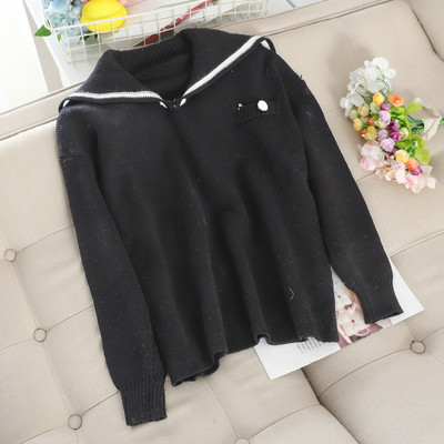 Μοντέρνο γυναικείο πουλόβερ σε λευκό και μαύρο χρώμα